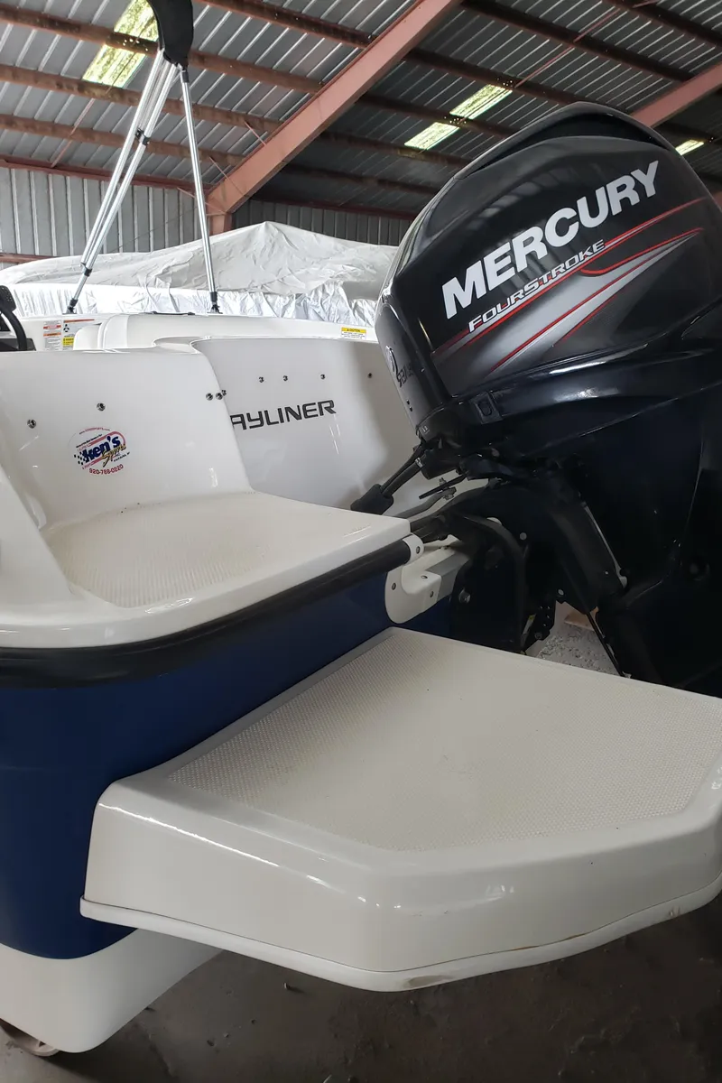 Slide: The Image of 2020 Bayliner Element E16 boat with Mercury outboard motor in storage. - 7