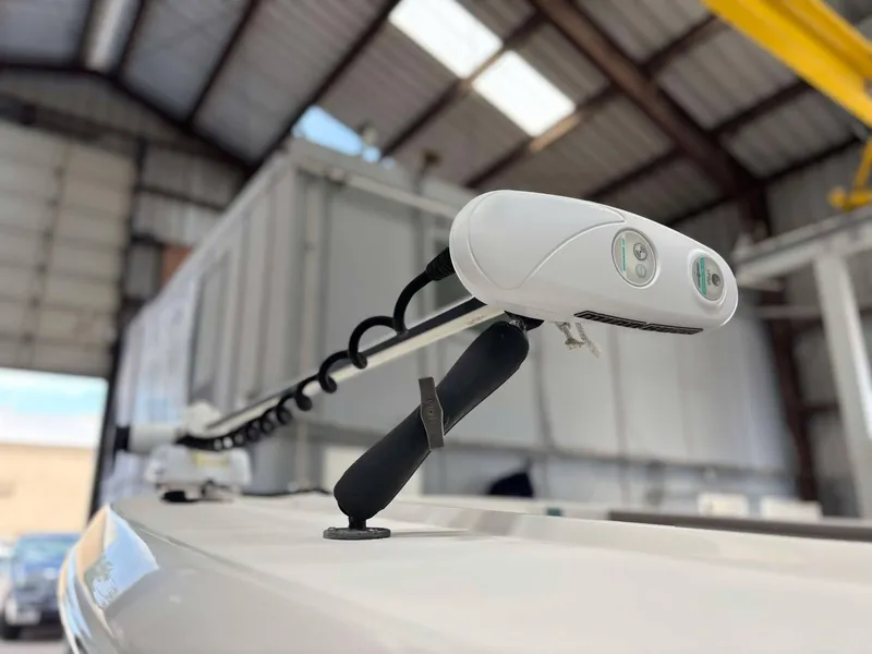 Slide: The Image of Close-up of a 2014 Andros Tarpon 26 boat detail in a warehouse setting. - 5