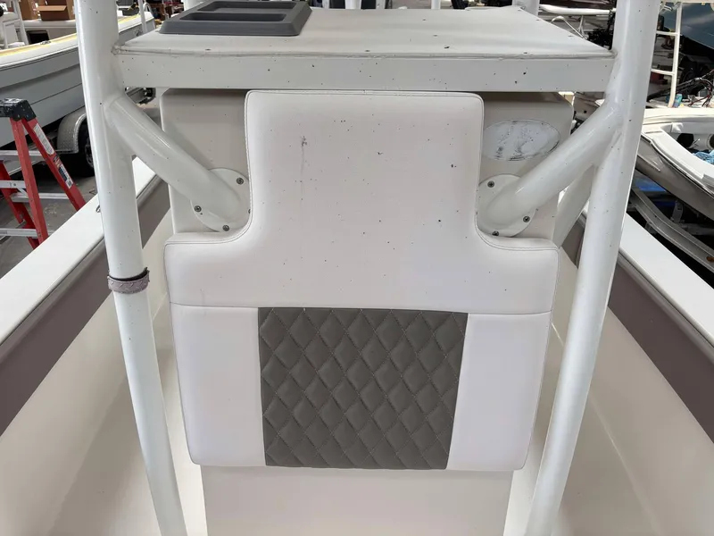Slide: The Image of 2014 Andros Tarpon 26 boat seat with diamond-patterned upholstery. - 8