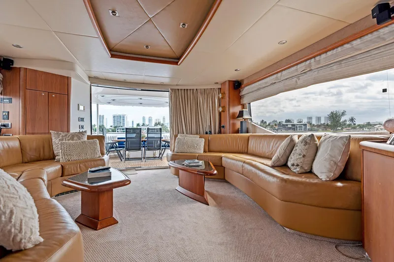 Slide: The Image of Luxurious interior of a 2006 Sunseeker 75 Yacht with elegant leather seating and large windows. - 22
