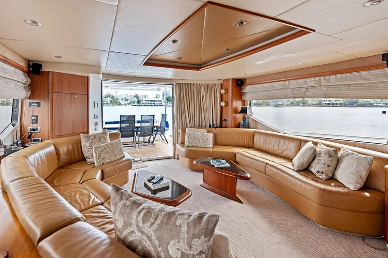 Slide: The Image of Luxurious interior of a 2006 Sunseeker 75 Yacht with elegant leather seating and panoramic windows. - 25
