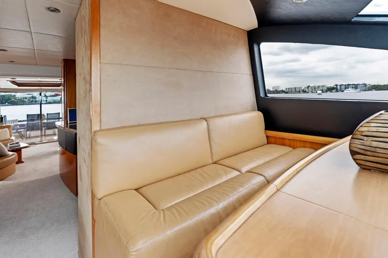 Slide: The Image of Interior of 2006 Sunseeker 75 Yacht with beige leather seating and large window view. - 30