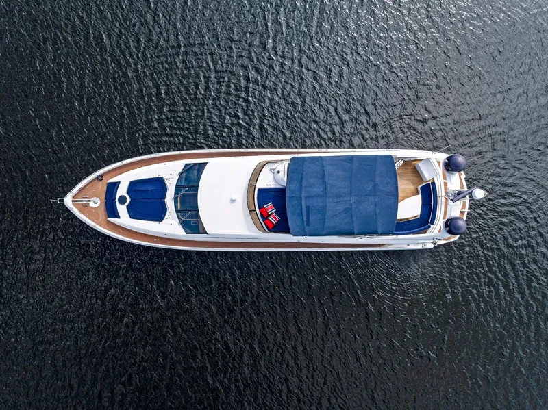 Slide: The Image of Aerial view of 2006 Sunseeker 75 Yacht on calm water. - 7