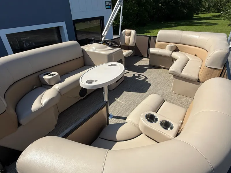 Slide: The Image of 2019 Bentley Pontoons 180 CRUISE interior with beige seating and round table. - 11
