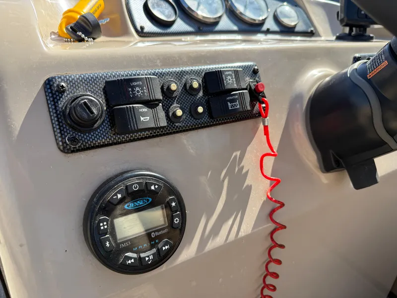 Slide: The Image of Control panel of a 2019 Bentley Pontoons 180 CRUISE boat with switches and gauges. - 15