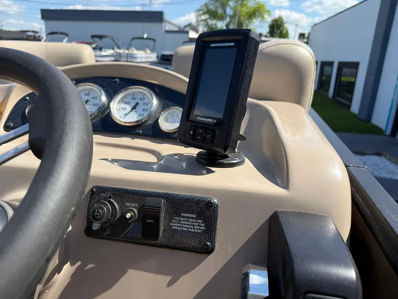 Slide: The Image of 2019 Bentley Pontoons 180 CRUISE dashboard with gauges and navigation system. - 16