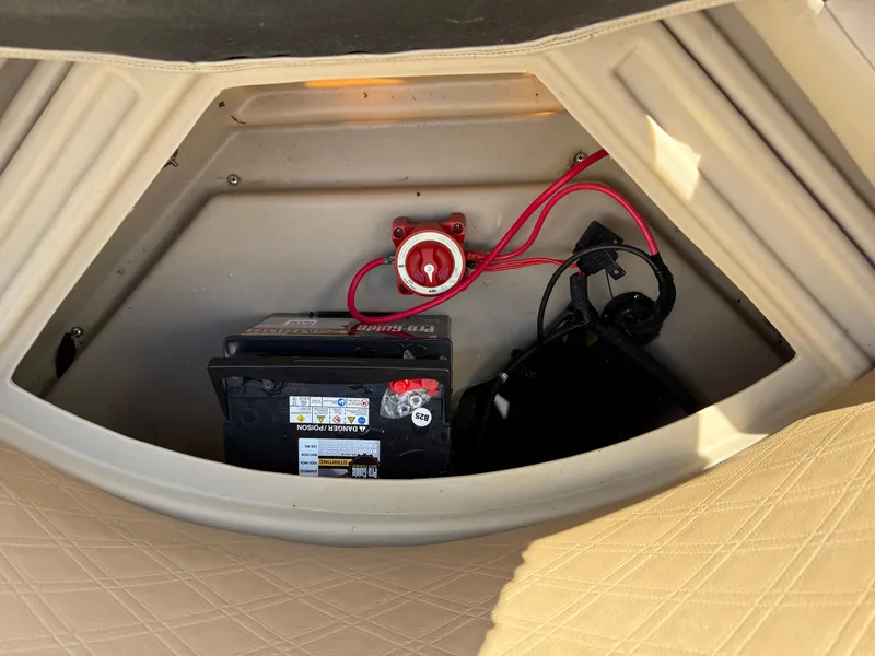 Slide: The Image of Battery compartment of 2019 Bentley Pontoons 180 CRUISE with wiring and switch. - 19