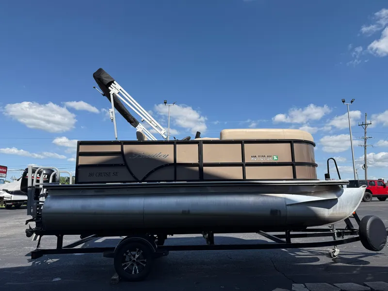 Slide: The Image of 2019 Bentley Pontoons 180 CRUISE on trailer under blue sky. - 3