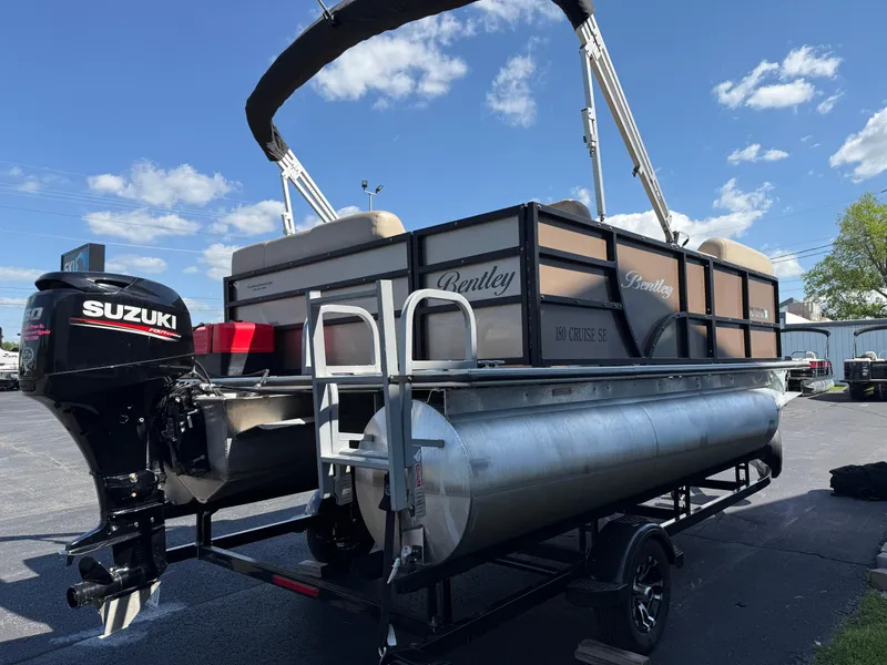 Slide: The Image of 2019 Bentley Pontoons 180 CRUISE with Suzuki outboard motor on trailer. - 5