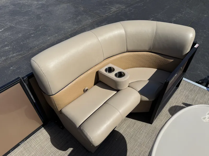 Slide: The Image of 2019 Bentley Pontoons 180 CRUISE beige seating with cup holders on a boat deck. - 9