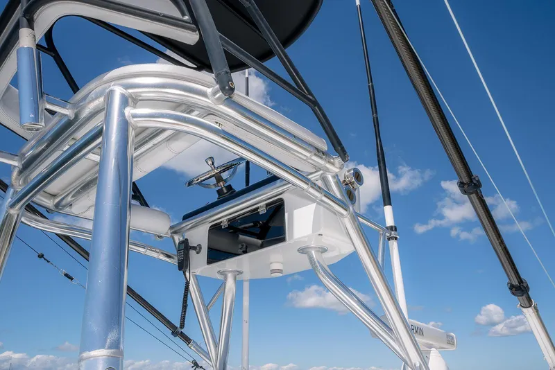 Slide: The Image of 2022 Contender 39 ST boat tower against a clear blue sky. - 30