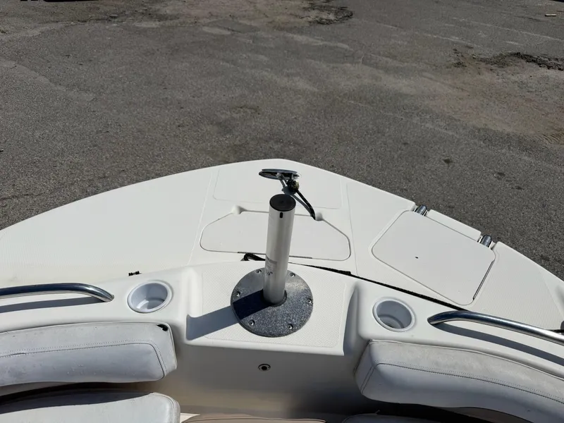 Slide: The Image of 2002 Hurricane FunDeck 211 O/B boat deck with seating and cup holders. - 3