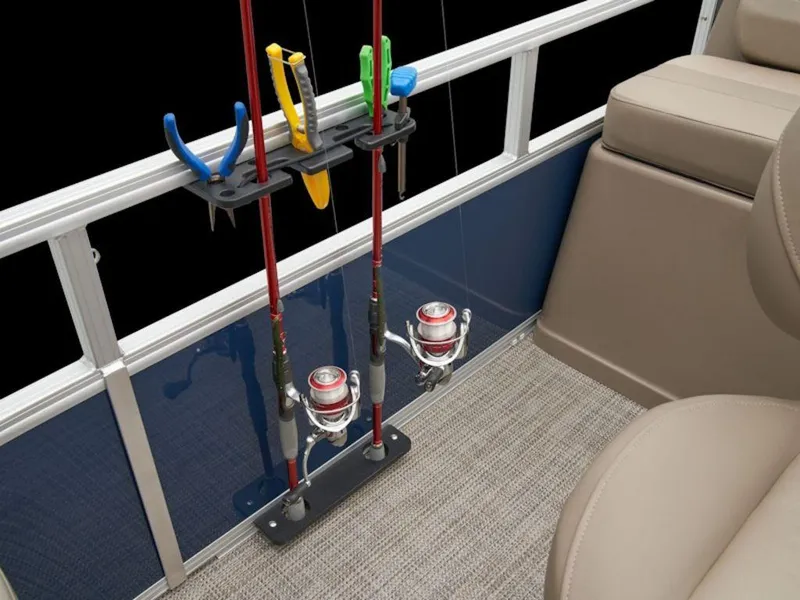 Slide: The Image of Fishing rods and tools on a 2024 Ranger 200F boat interior. - 9