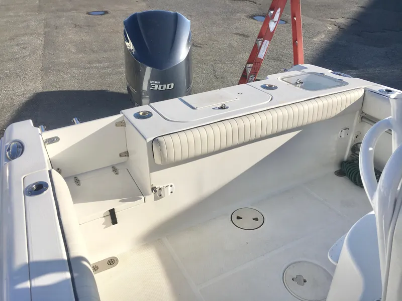 Slide: The Image of 2014 Sea Hunt Gamefish 25 boat interior with Yamaha 300 engine. - 11