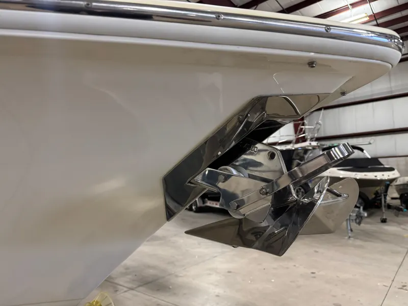 Slide: The Image of 2016 Scout 255 LXF boat with stainless steel anchor in a warehouse. - 20
