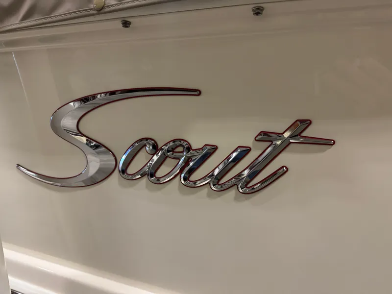 Slide: The Image of Chrome "Scout" logo on 2016 Scout 255 LXF boat. - 23