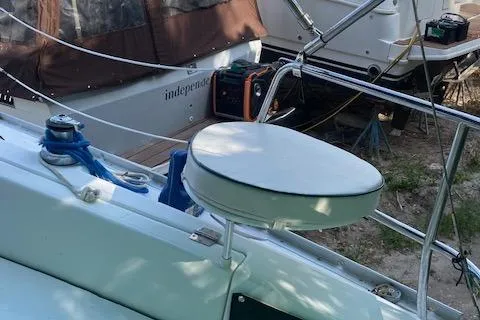 Slide: The Image of 2006 Beneteau Oceanis Clipper 323 sailboat deck with winch and seating. - 16