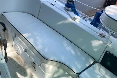 Slide: The Image of Cockpit seating on 2006 Beneteau Oceanis Clipper 323 sailboat, featuring winch and control panel. - 17