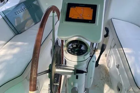 Slide: The Image of Steering wheel and navigation system of 2006 Beneteau Oceanis Clipper 323 sailboat. - 18