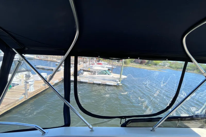 Slide: The Image of View from 2005 Mainship 400 Trawler, overlooking marina and docked boats. - 36