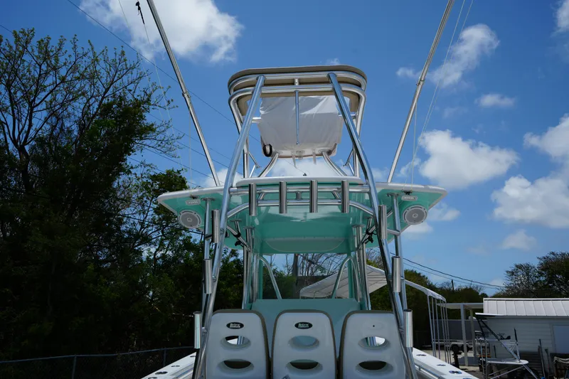 Slide: The Image of 2015 Contender 39ST boat with tower against a clear blue sky. - 16