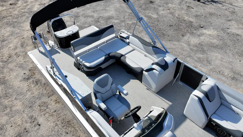 Slide: The Image of 2025 Avalon LSZ Cruise Rear Bench pontoon boat with spacious seating and modern design. - 3