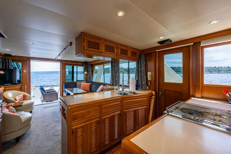 Slide: The Image of Luxurious interior of 1997 Offshore Yachts 52 Sedan with scenic ocean view. - 18
