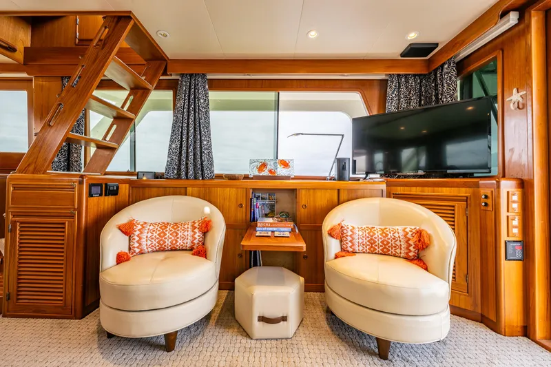 Slide: The Image of Luxurious interior of 1997 Offshore Yachts 52 Sedan with plush seating and modern decor. - 20