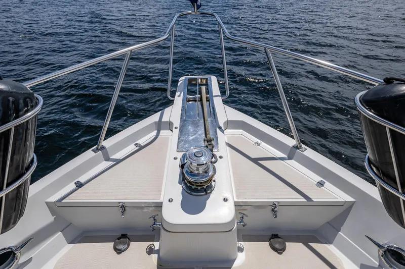 Slide: The Image of Bow view of 1997 Offshore Yachts 52 Sedan on open water. - 40