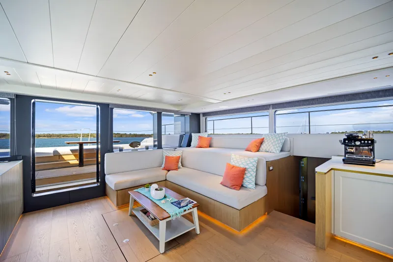 Slide: The Image of Luxurious interior of 2026 McConaghy 82P yacht with modern seating and ocean view. - 19