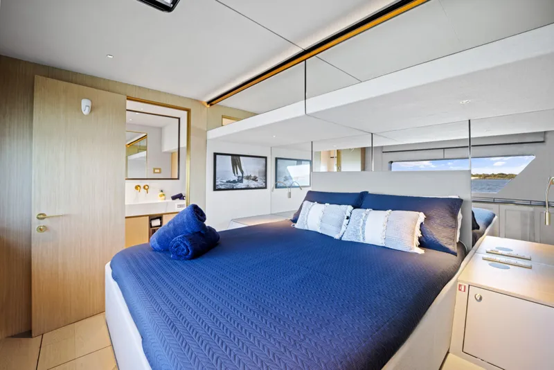Slide: The Image of Luxurious bedroom interior of 2026 McConaghy 82P yacht with modern design and elegant decor. - 39