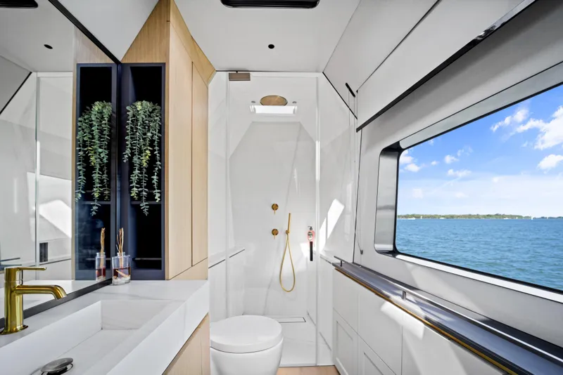 Slide: The Image of Luxurious McConaghy 82P yacht bathroom with ocean view, modern fixtures, and elegant design, 2026 model. - 43