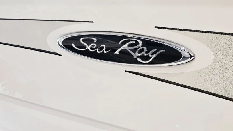 Slide: The Image of Sea Ray 220 Sundeck Outboard 2014 logo on boat exterior. - 31
