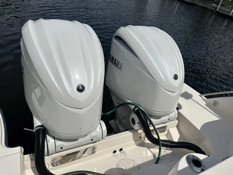 Slide: The Image of Twin Yamaha outboard engines on a 2023 Grady-White Freedom 325 boat. - 22