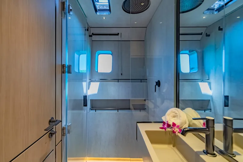 Slide: The Image of Luxurious bathroom interior of 2026 McConaghy MC75 yacht with modern fixtures and elegant design. - 13