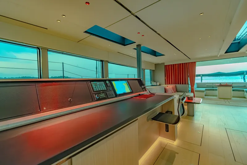 Slide: The Image of Luxurious interior of 2026 McConaghy MC75 yacht with modern navigation equipment and panoramic windows. - 7