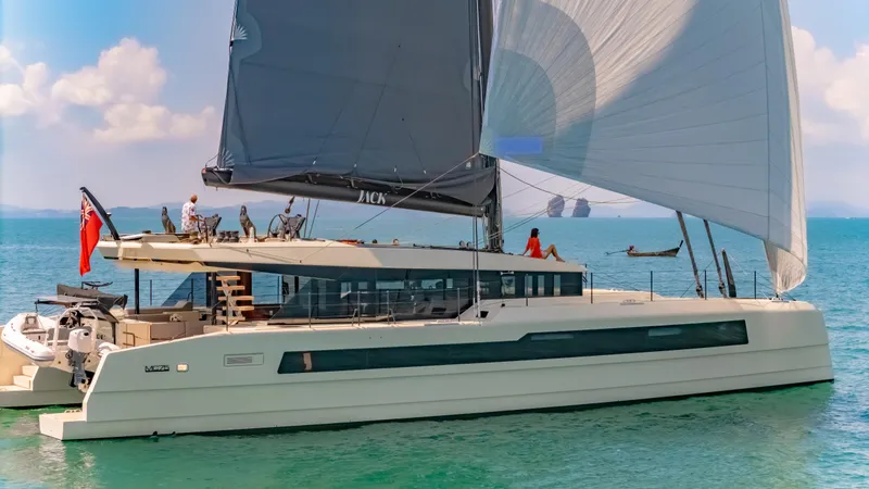 Slide: The Image of 2026 McConaghy MC75 yacht sailing on clear blue waters under a sunny sky. - 9