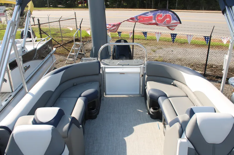 Slide: The Image of 2024 Avalon LSZ Quad Lounger boat interior with plush seating and modern design. - 10