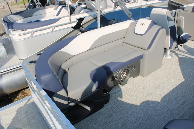 Slide: The Image of 2024 Avalon LSZ Quad Lounger boat interior with plush seating and modern design. - 14
