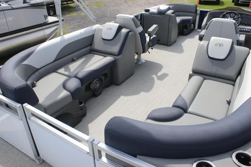 Slide: The Image of 2024 Avalon LSZ Quad Lounger pontoon boat with spacious seating and modern design. - 4