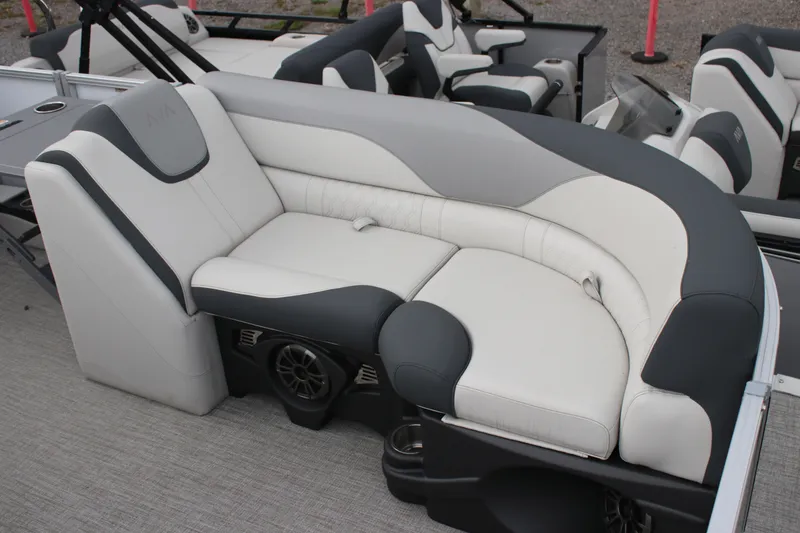 Slide: The Image of 2025 Avalon LSZ Quad Lounger boat seating with gray and white upholstery. - 18