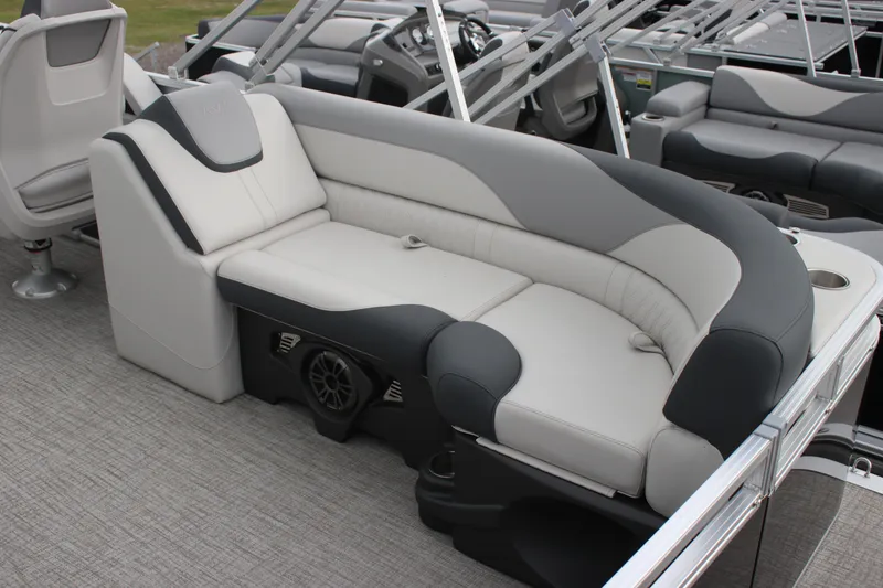 Slide: The Image of 2025 Avalon LSZ Quad Lounger boat interior with plush seating and modern design. - 25