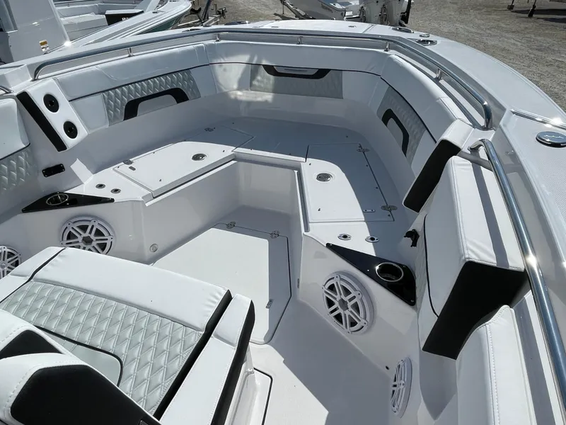 Slide: The Image of 2025 Blackfin 272CC boat interior with sleek seating and modern design. - 13