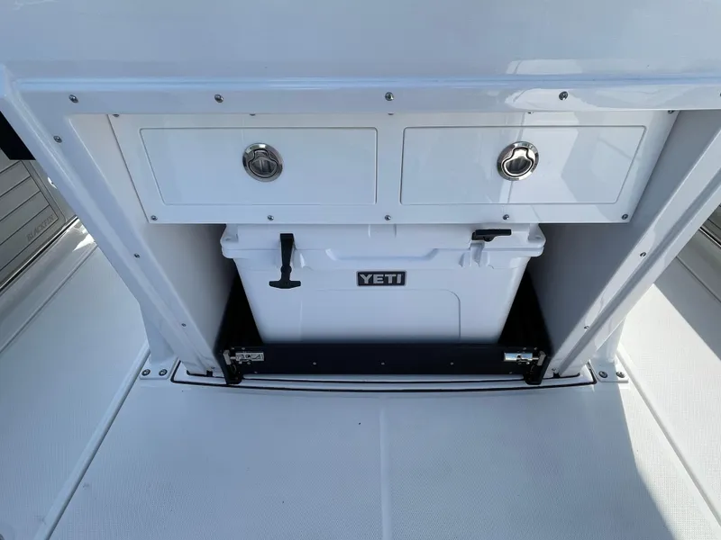 Slide: The Image of 2025 Blackfin 272CC boat interior with Yeti cooler and storage drawers. - 30