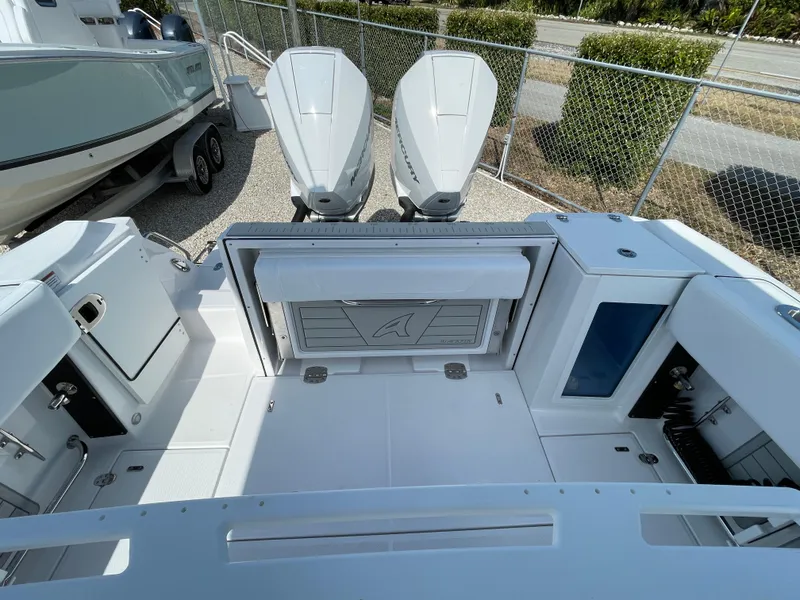 Slide: The Image of 2025 Blackfin 272CC boat deck with dual engines and spacious layout. - 33