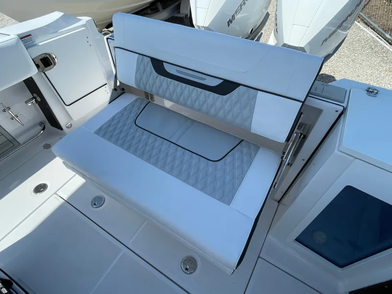 Slide: The Image of 2025 Blackfin 272CC boat with sleek seating and modern design. - 39