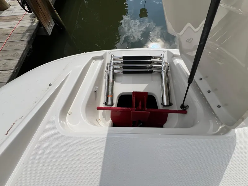 Slide: The Image of 2010 Sea Ray 280 Sundeck swim platform with retractable ladder and storage compartment. - 16