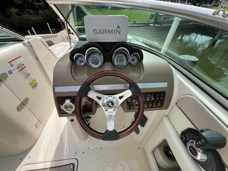 Slide: The Image of Steering console of 2010 Sea Ray 280 Sundeck with Garmin navigation system. - 3