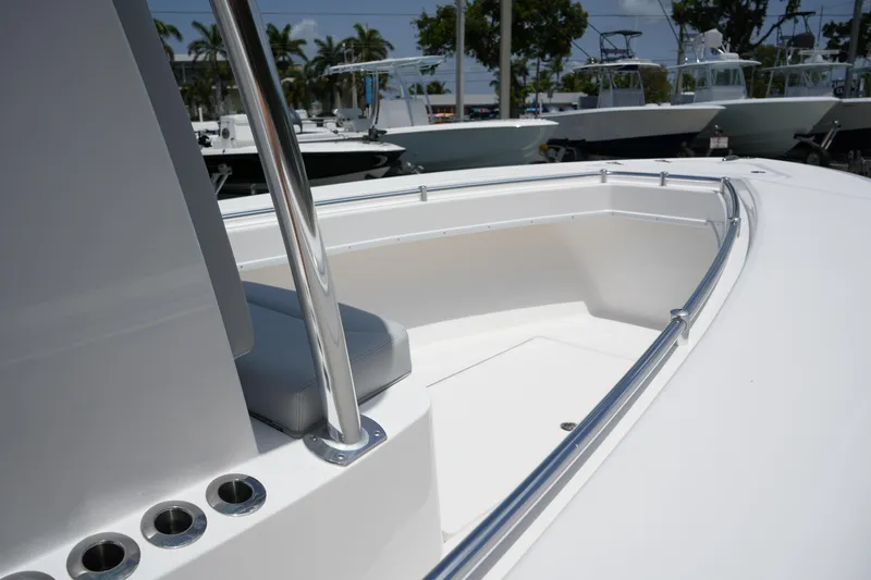 Slide: The Image of 2025 Contender 25T boat deck with sleek design and stainless steel railings. - 10