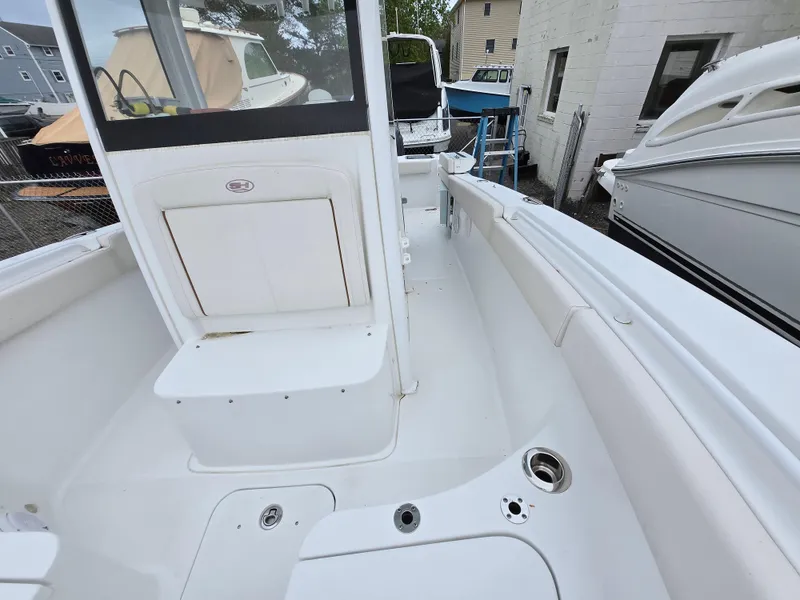 Slide: The Image of 2020 Sea Hunt Gamefish 25 boat interior, featuring spacious seating and sleek design. - 8